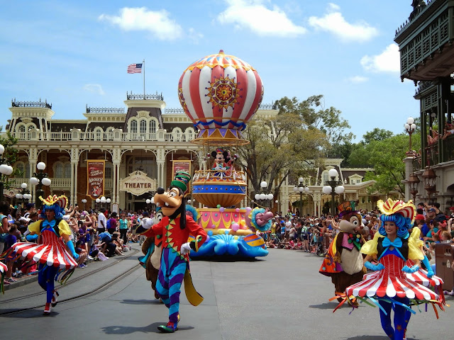 New Disney World Parade: Festival of Fantasy. To finish it off, the big cheese himself floats by in a hot air balloon.