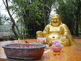 smiling Buddha statue at Beihai Park