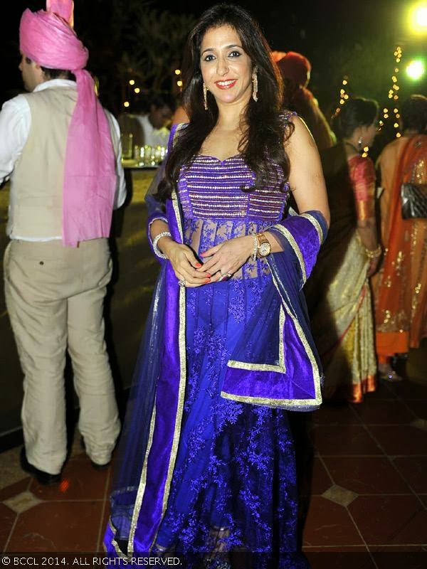 Krishika Lulla grabs attention in purple attire during Raageshwari Loomba and Sudhanshu Swaroop's wedding, held in Mumbai, on January 27, 2014.<br />  