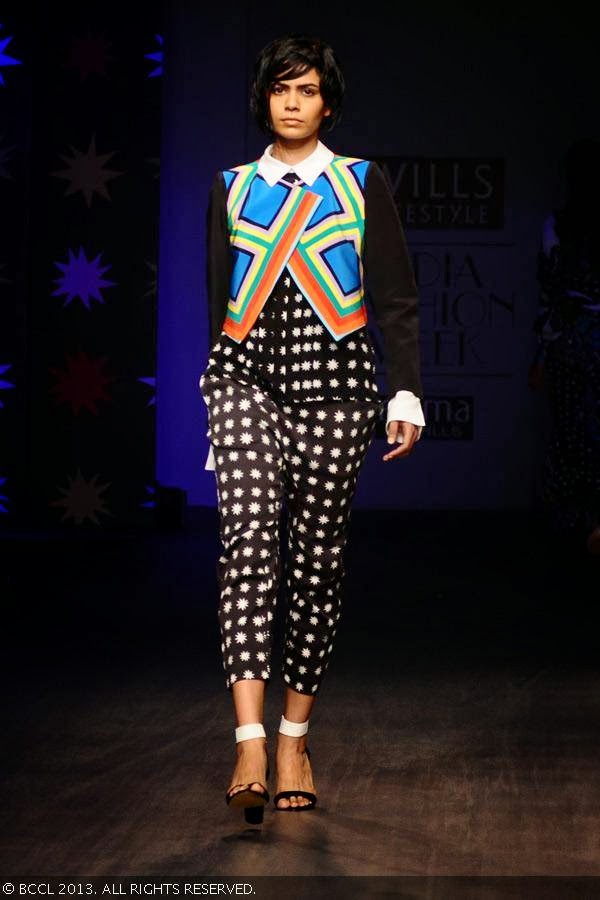 Nolana walks the ramp for designer duo Anna Plunkett and Luke Sales on Day 1 of the Wills Lifestyle India Fashion Week (WIFW) Spring/Summer 2014, held in Delhi.