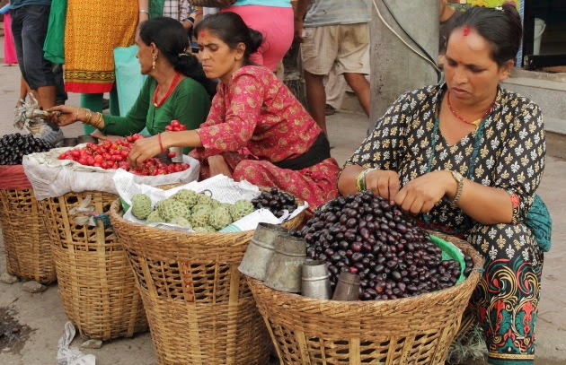 Fruit and Chilli Hawkers on the streets of Kathmandu, NepalSurprised Woman on the streets of Kathmandu, Nepal