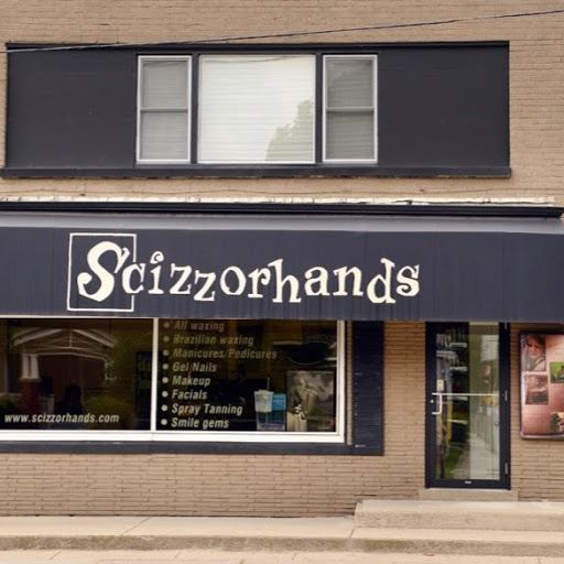 Scizzorhands Salon & Spa logo