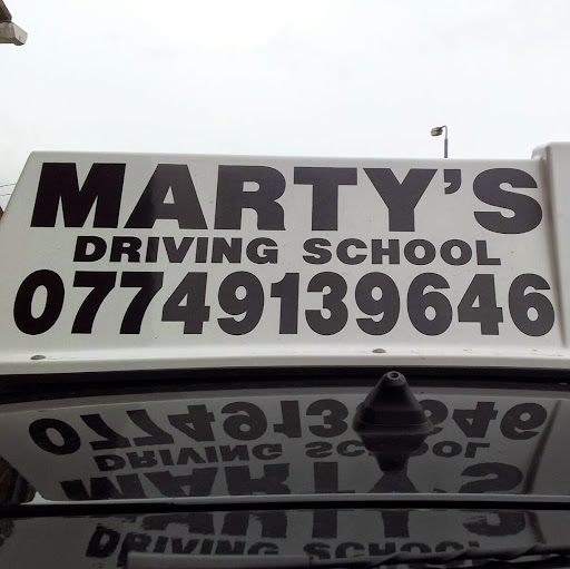 Marty's Driving School logo