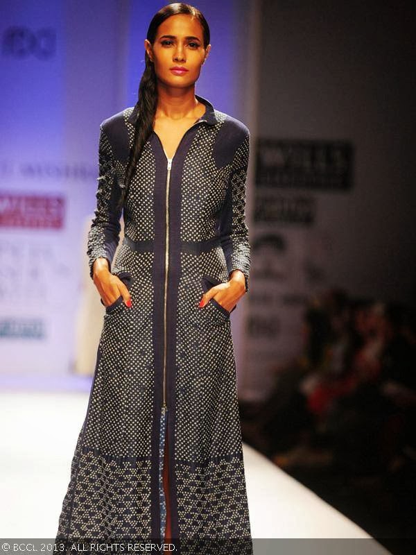 A model walks the ramp for fashion designer Rahul Mishra on Day 2 of the Wills Lifestyle India Fashion Week (WIFW) Spring/Summer 2014, held in Delhi.