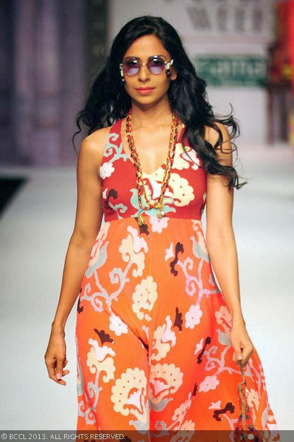 Candice Pinto showcases a creation by fashion designer Anupama Dayal on Day 1 of Wills Lifestyle India Fashion Week (WIFW) Spring/Summer 2014, held in Delhi.