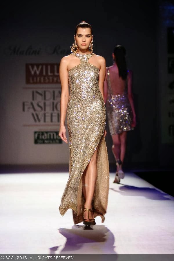 Katrin walks the ramp for fashion designer Malini Ramani on Day 1 of the Wills Lifestyle India Fashion Week (WIFW) Spring/Summer 2014, held in Delhi.