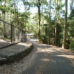 Trail beside metal ring fence down towards Carnley Reserve in the Blackbutt Reserve (400093)