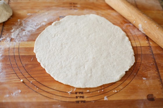 process photo showing how to roll out the dough
