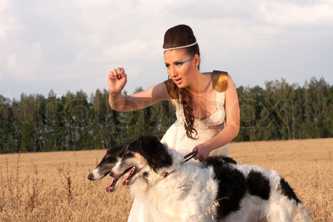 2819856-748365-woman-in-clothes-of-18-centuries-outdoors-hold-two-borzoi-dogs.jpg