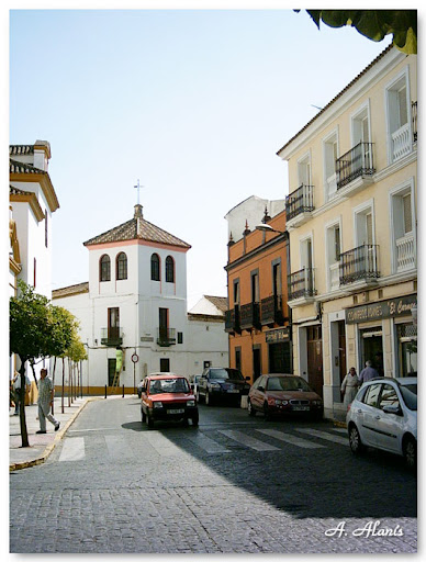 Calle Santa Ana al fondo la Torre del Olivar. Ayer y Hoy
