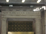 My 'clever' shot of the NYSE title and the Wall St street sign