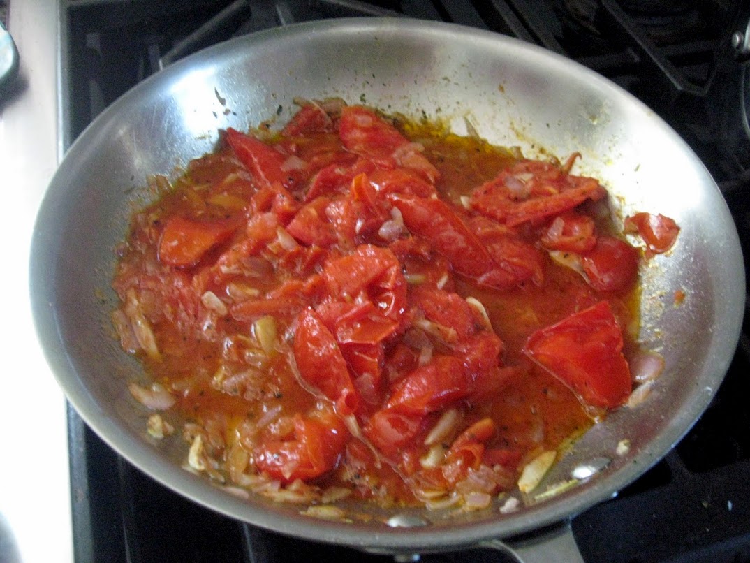 Another picture of classic marinara sauce; made with tomatoes from the garden and a small amount of diced onion, which is optional when it comes to marinara sauce.