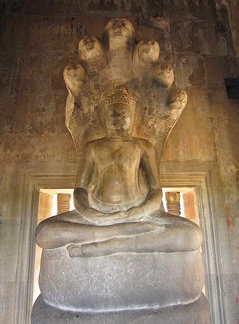 Buddha sitting on a Naga at Angkor Wat