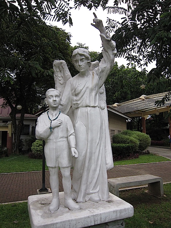 statue in the Holy Guardian Angels Park of the Ateneo de Manila Grade School