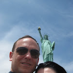 Attempt #1 at a self-shot of us and the statue.  Here, Mila has a Statue of Liberty-like growth coming out of her head.