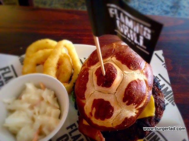 Flaming Grill Pubs Cheese and Bacon Pretzel Burger