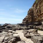 Sandy beach with rocks at Caves Beach Caves (387332)