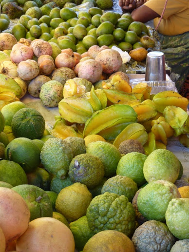 Passion fruit, star fruit, and oranges