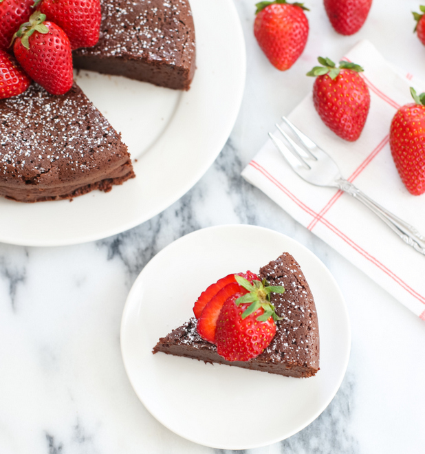 overhead photo of a slice of flourless chocolate cake