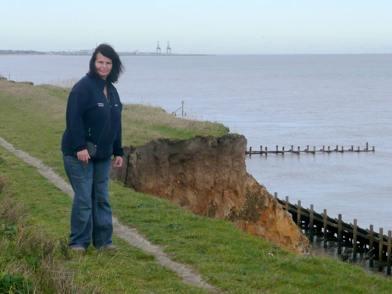 Coastal erosion threatens the footpath near Corton