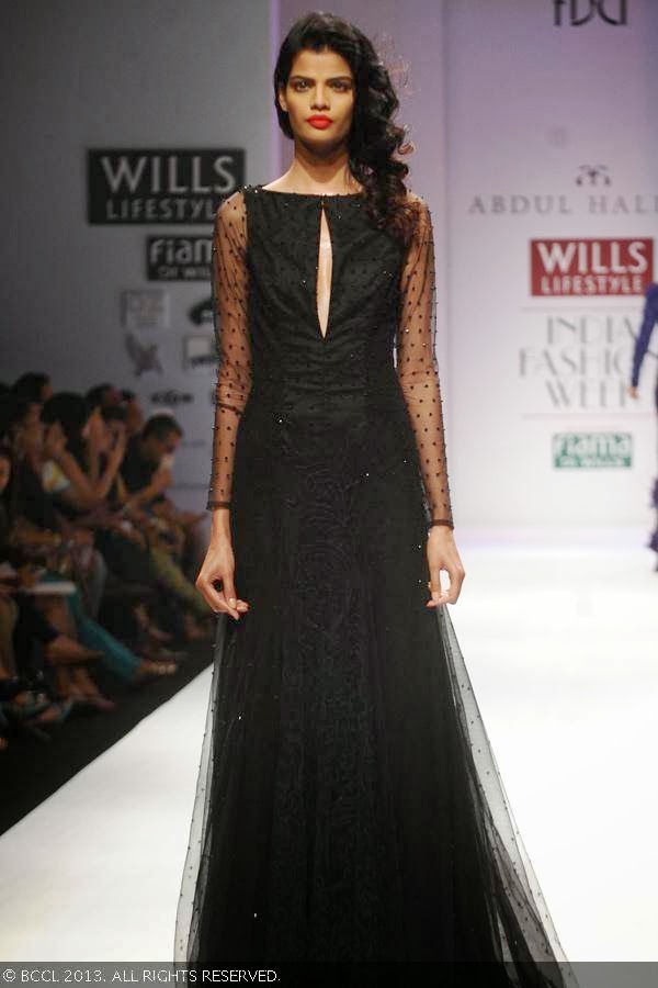 Bhumika showcases a creation by fashion designer Abdul Halder on Day 4 of Wills Lifestyle India Fashion Week (WIFW) Spring/Summer 2014, held in Delhi.