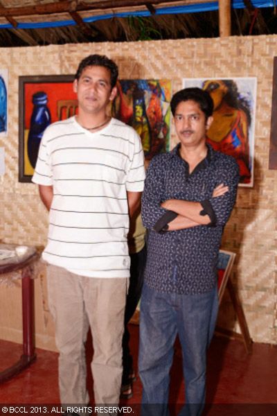 Amey Prabhu and Conrad Pinto at art bazaar held at Calangute in Goa.<br /> 