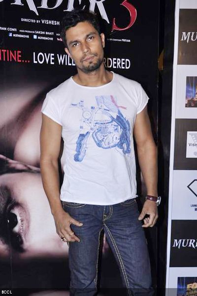 Randeep Hooda poses for the shutterbugs during the press meet of his movie 'Muder 3', held at F Bar in Mumbai.(Pic: Viral Bhayani)