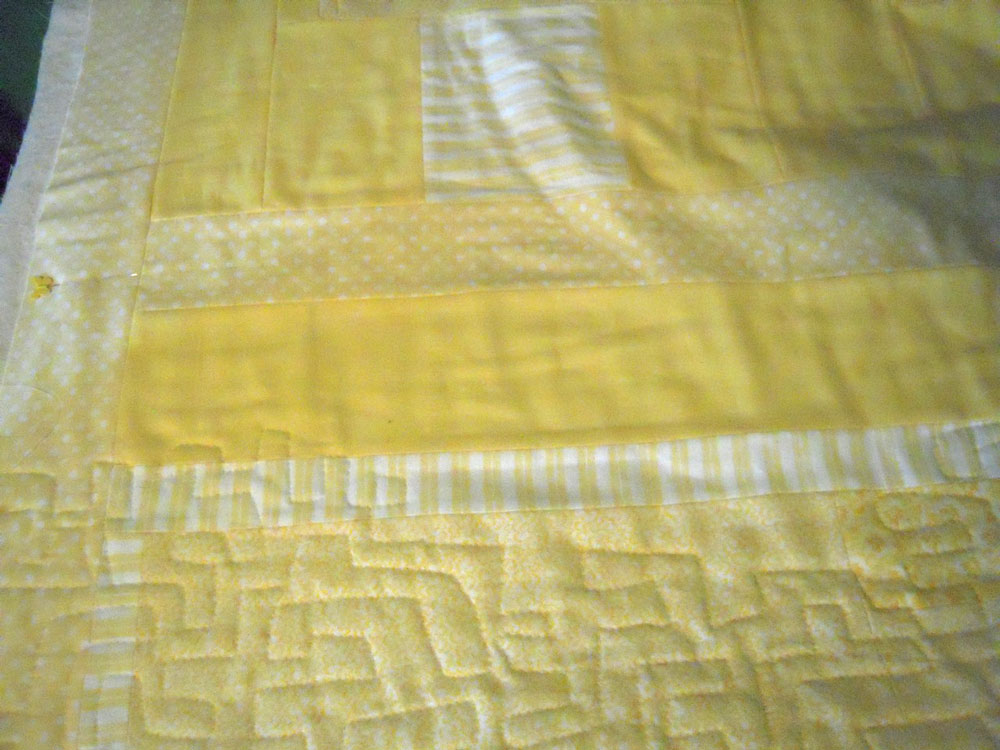Yellow quilting in progress