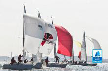 J/22s sailing under spinnaker off Netherlands