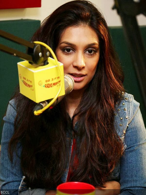 Preeti Desai connects with the listeners during the promotion of the movie One By Two, held at Radio Mirchi, in Mumbai. 