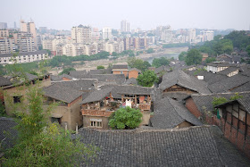 view of older homes and newer apartment buildings in Zigong, Sichuan Province