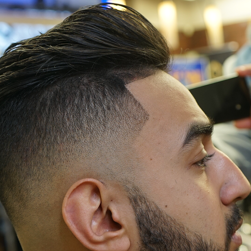 Rami's Cut Barber logo