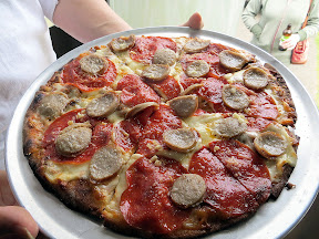 Pulehu Pizza grilled pizza Meat Lovers with pepperoni, sausage, garlic, and grana padano 