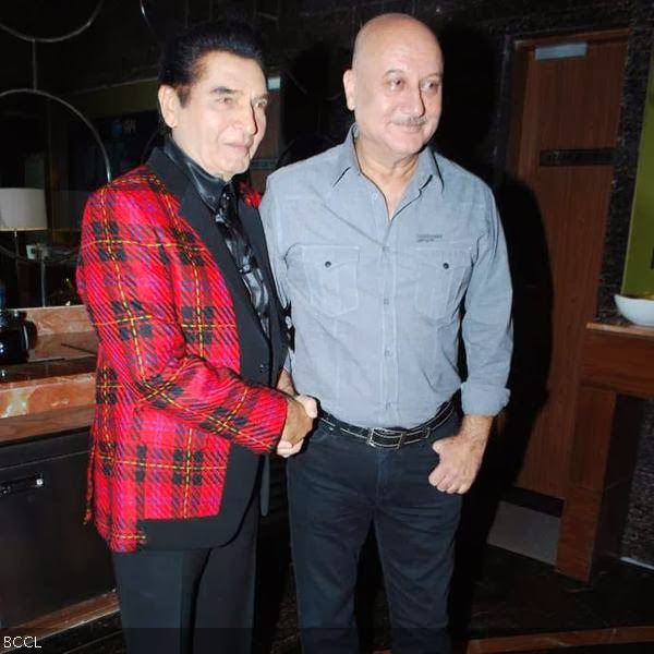 Asrani with Anupam Kher during the first look unveiling of the movie Gang Of Ghosts, held in Mumbai, on February 11, 2014. (Pic: Viral Bhayani)