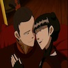 Mai and Zuko snuggled together; Mai smiling open-mouthed