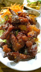 Nua Daahd Diew, a marinated sirloin dish air dried and deep fried from Isaan Station