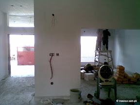 Paint: Wall filling or wall putty being done