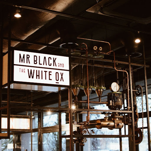 Mr. Black and the White Ox