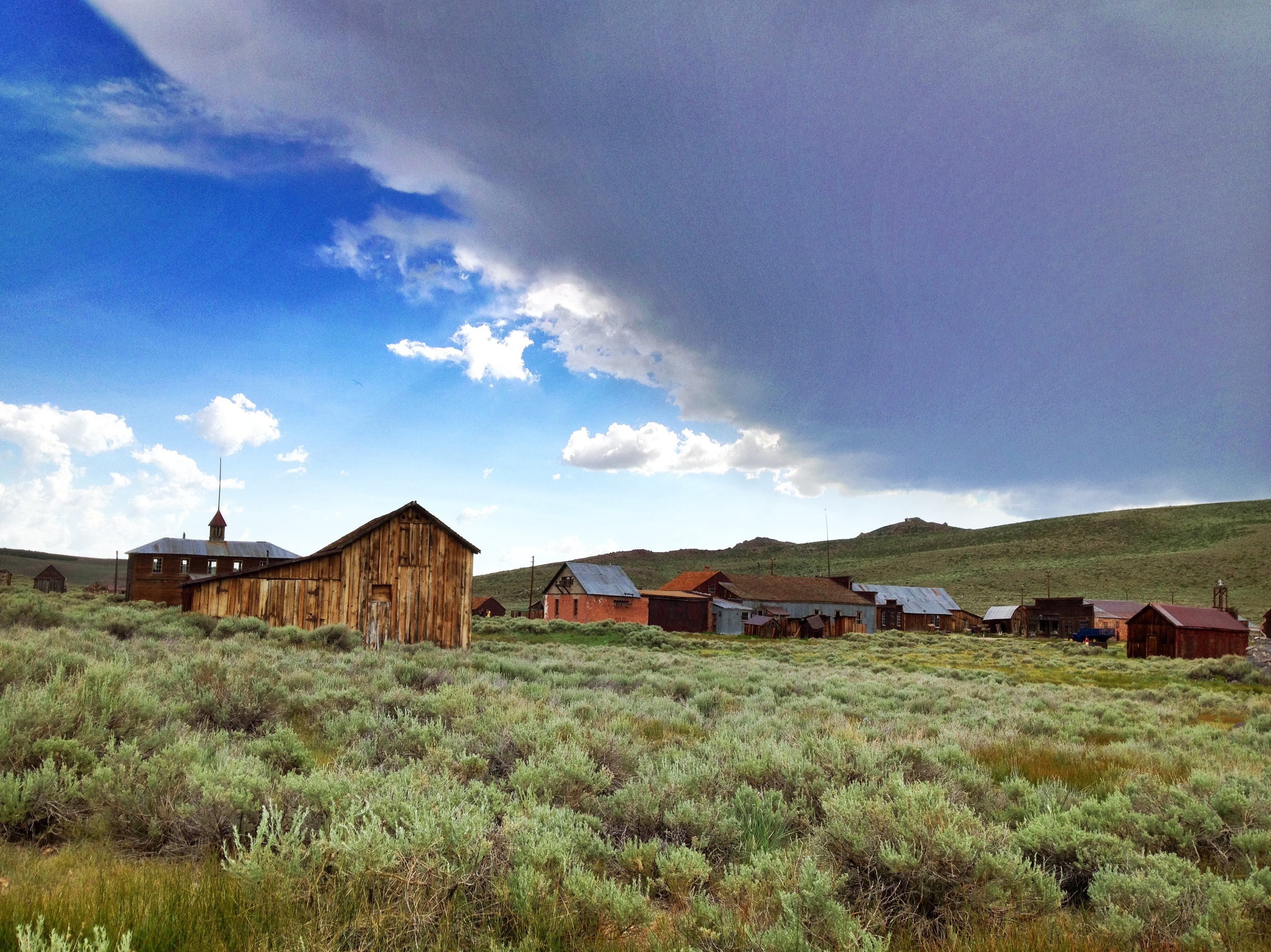 Bodie under an impending storm clouds