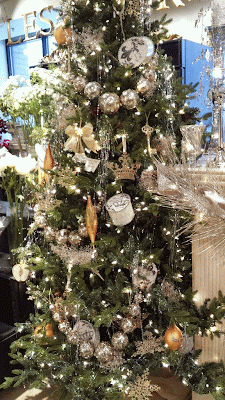 Christmas Decorations on a white and silver holiday Christmas tree at Chicago French Market