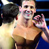 Ryan Lochte's got a supremely attractive smile and ridiculous....eyes.  So glad he got a hair cut.