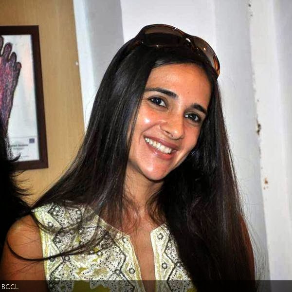 Tara Sharma with a warm smile at the launch of children painiting exhibition, held in Mumbai, on October 9, 2013. (Pic: Viral Bhayani)