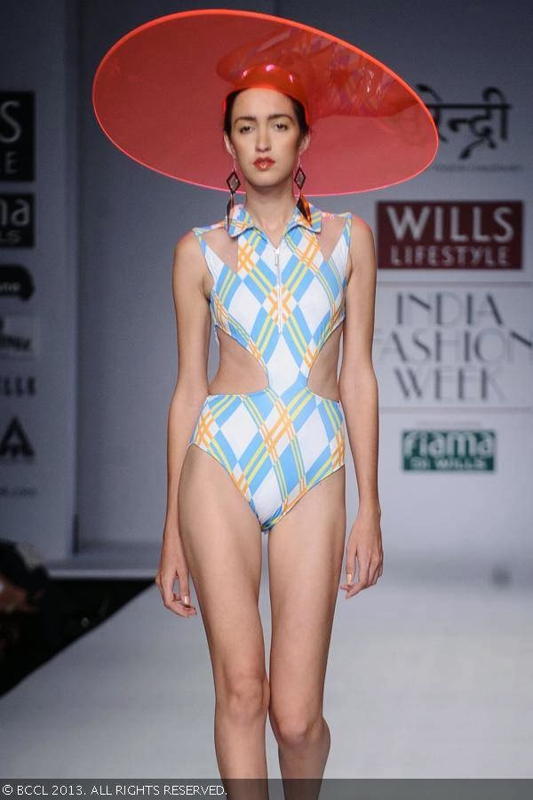 Tamara Moss showcases a creation by fashion designer Yogesh Chaudhary on Day 4 of Wills Lifestyle India Fashion Week (WIFW) Spring/Summer 2014, held in Delhi.