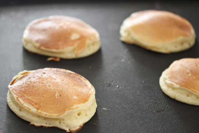 photo of pancakes on a griddle