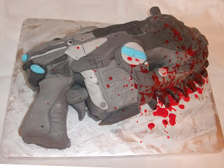 A "Gears of War" Lancer cake, complete with edible blood