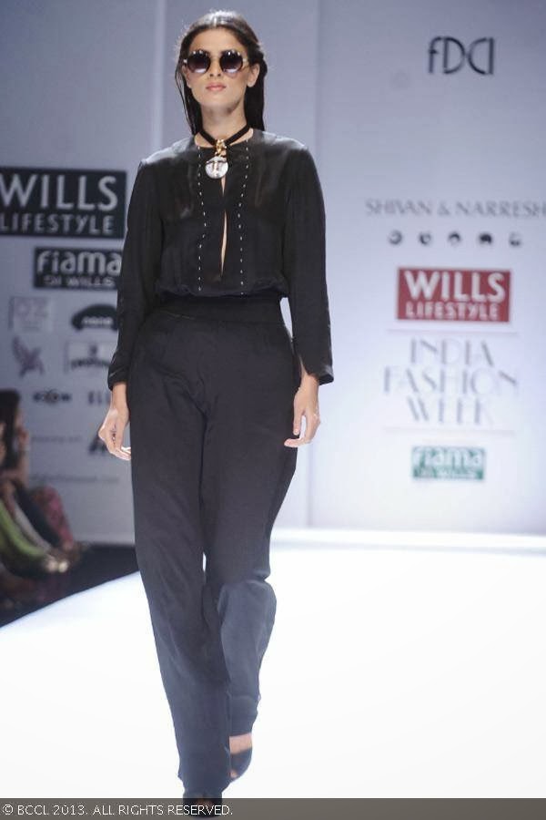 Preeti walks the ramp for fashion designers Shivan & Narresh on Day 2 of the Wills Lifestyle India Fashion Week (WIFW) Spring/Summer 2014, held in Delhi.