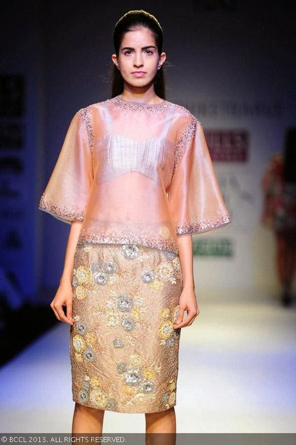 Preeti walks the ramp for fashion designer Nachiket Barve on Day 1 of the Wills Lifestyle India Fashion Week (WIFW) Spring/Summer 2014, held in Delhi.