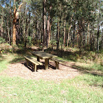 Picnic table next to tower (234590)