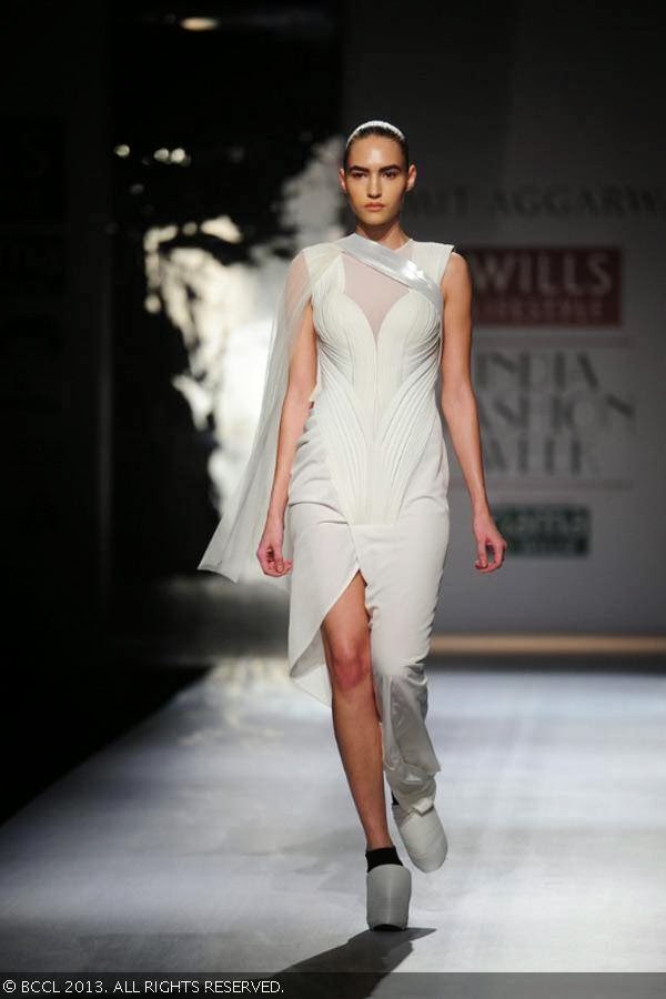 Katya walks the ramp for fashion designer Amit Aggarwal on Day 2 of the Wills Lifestyle India Fashion Week (WIFW) Spring/Summer 2014, held in Delhi.