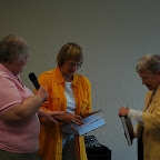 Alice HIx and Jean Gleaves present Gleaves books to Kegley Library